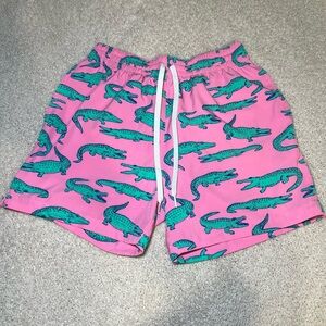 Chubbies Pink Swim Trunks with Green Alligator Design